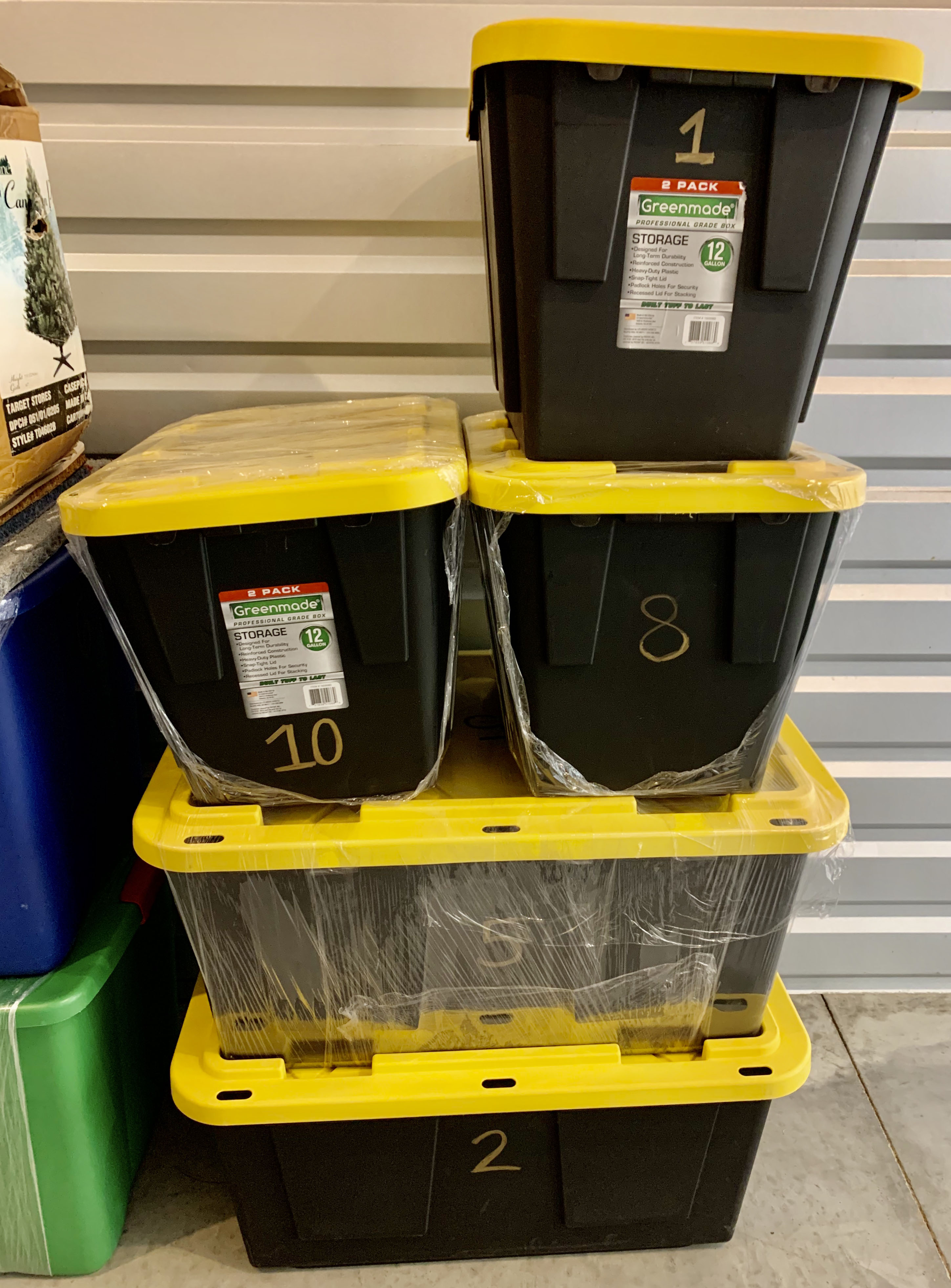 labeled black storage bins